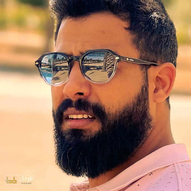 نظارة شمسية مستديرة بإطار أسود وعدسات عاكسة Round Black Frame Sunglasses with Reflective Lenses